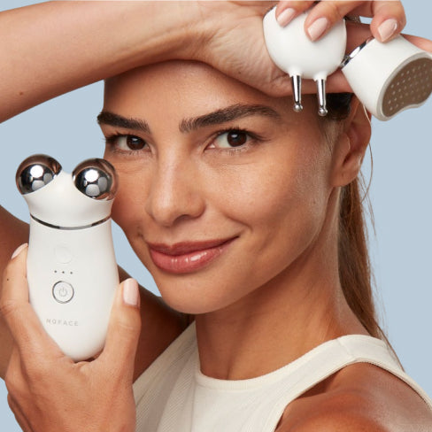 Woman with a Trinity plus device and attachments 